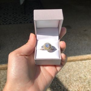 Masonite and white diamond and canary diamond ring set in 14kG white and yellow.